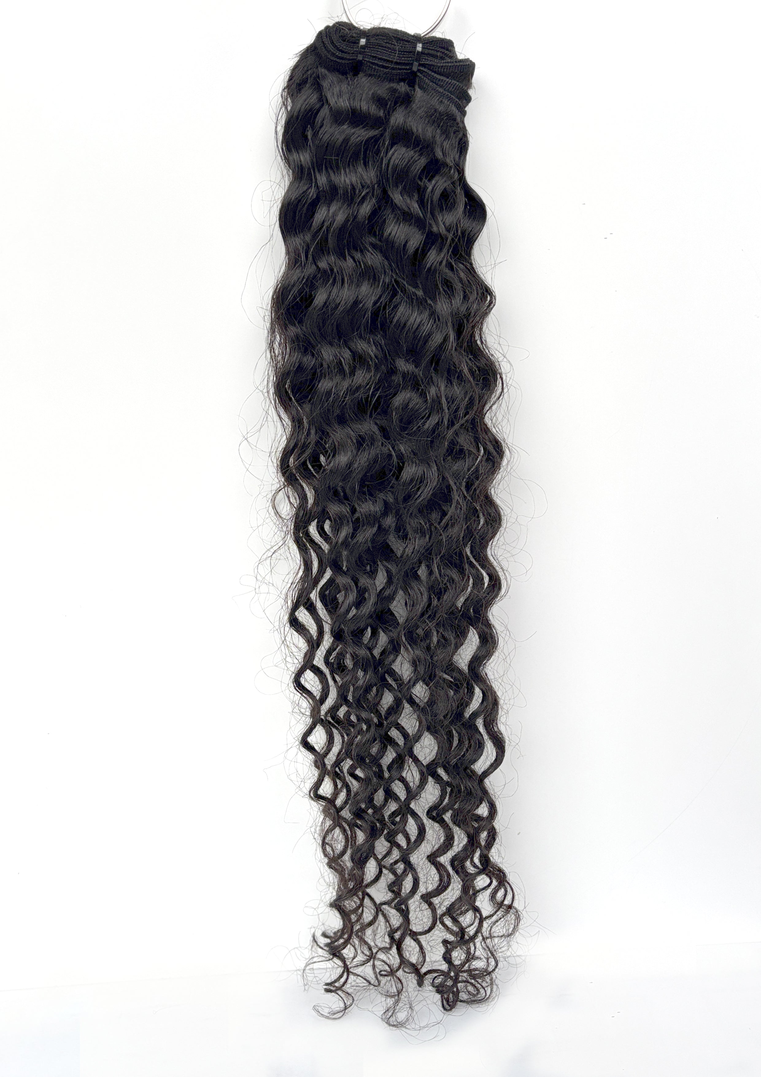 Black curly Vietnamese raw hair extensions on a white background