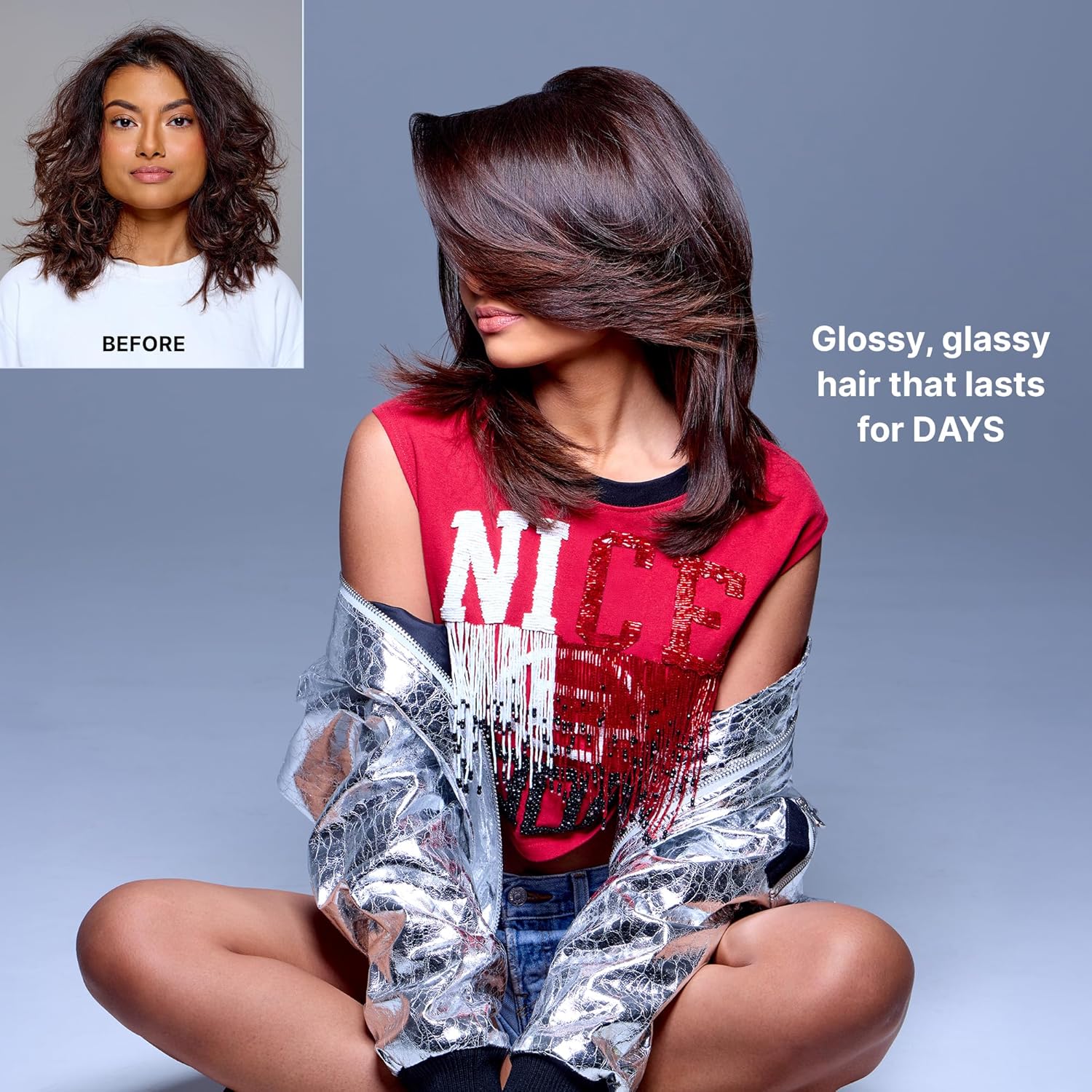 Person with glossy hair styled in a way that covers their face, wearing a red shirt and silver jacket, with text 'Glossy, glassy hair that lasts for DAYS' on a gray background.