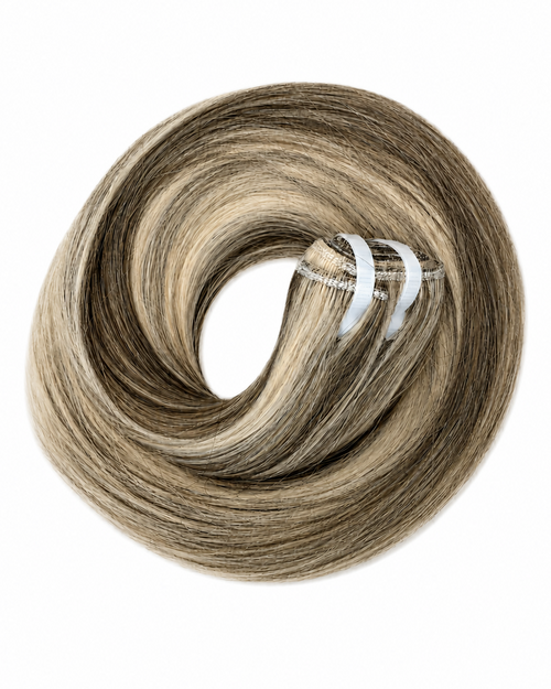 Loop of hair extensions on a white background