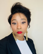 a full lace pixie bob wig with soft volume, a natural side part and tapered finish.