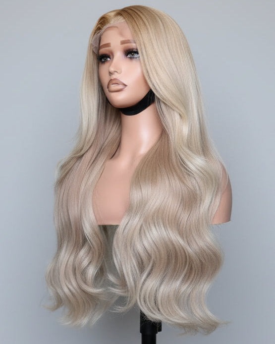 Blonde raw Vietnamese hair wig made from single donor bundles on a mannequin head against a plain background