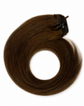 Soft ash-brown raw hair extensions on a white background.
