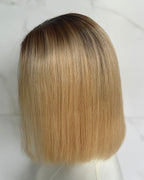 Blonde wig with a gradient on a white background
